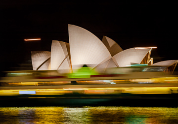Sydney Harbour ferry passing in front of the Opera House.