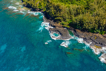 Lava rock formations on the Princeville coast.