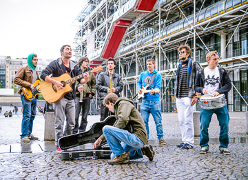 French boy band playing outside Pompidou Centre.