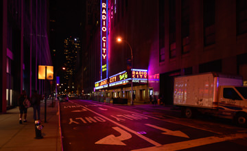 Radio City Music Hall neon glow at night.