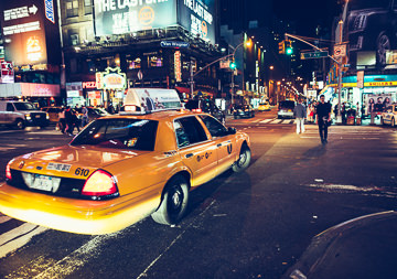 Times Square intersection and NYC taxi.